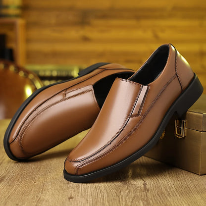 Classic men's leather slip-on loafers, ideal for formal footwear or casual wear.