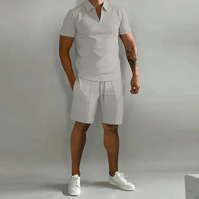Coordinated men's summer polo shirt and shorts set, ideal for relaxed yet smart warm-weather styling.