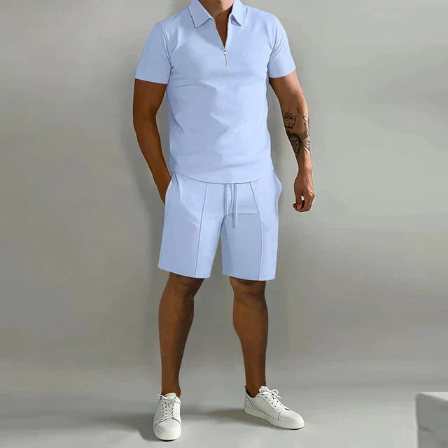 Zipper collar polo shirt and matching shorts in a men's lightweight summer outfit, two-piece casual set.
