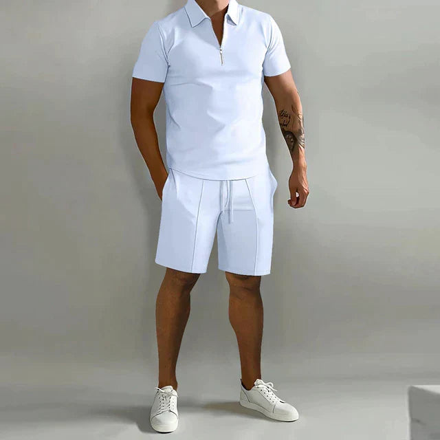 Stylish men's summer outfit: a comfortable polo shirt and shorts set for a smart casual warm-weather look.
