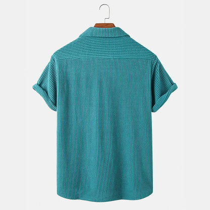 Modern men's soft casual button-up shirt. Easy care, versatile long sleeve top for everyday style.