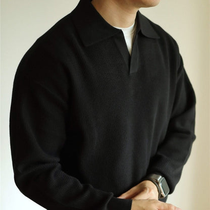 Texture detail of the soft, breathable knit fabric of the Men's Polo Shirt, emphasizing quality material.