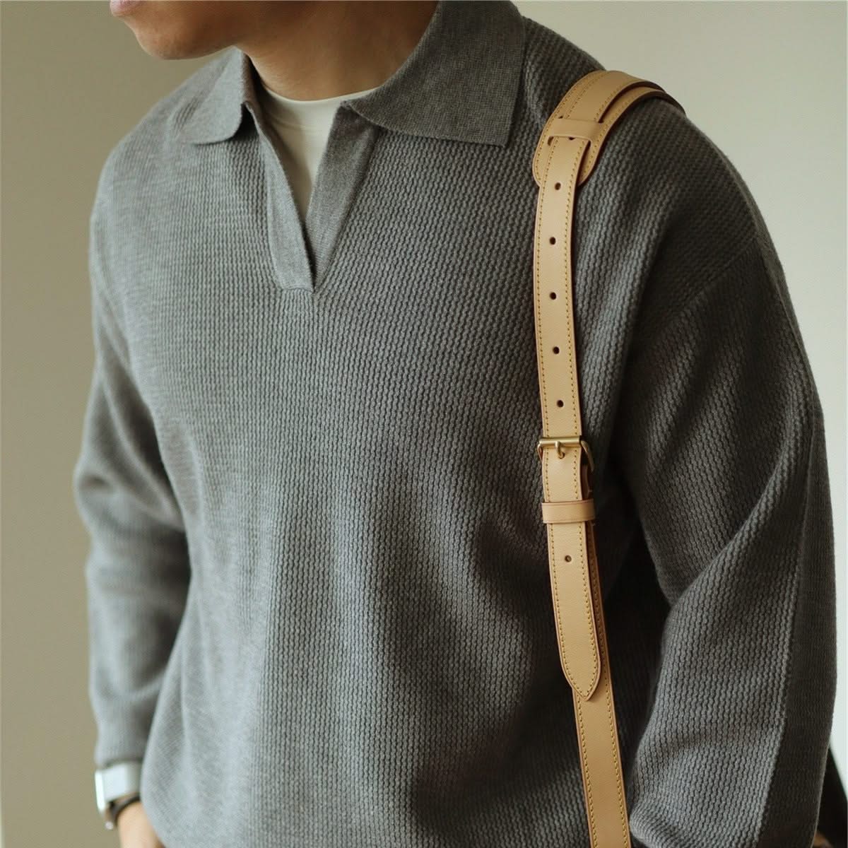 Elegant Cream Men's Soft Knit Polo Shirt, made from soft, breathable fabric for ultimate comfort.