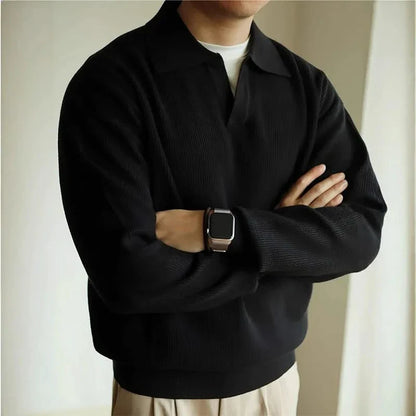 Detail of the classic collar on a Men's Soft Knit Polo, enhancing its timeless and refined style.