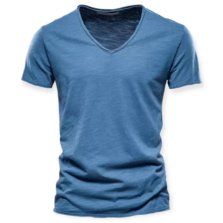 Classic men's V-neck t-shirt in a versatile solid hue. Short sleeve, ideal for comfortable daily styling & layering.