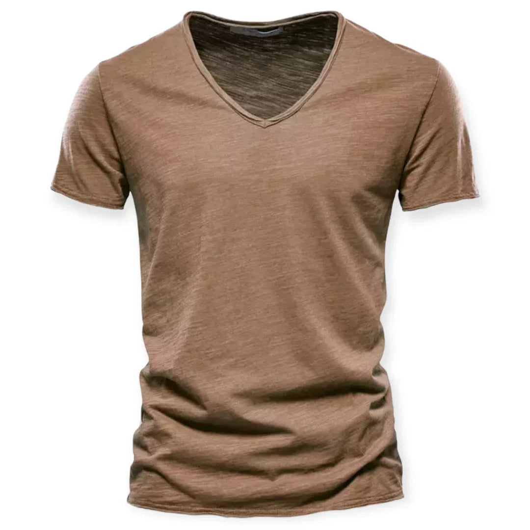Stylish men's V-neck t-shirt on a model, showcasing its comfortable fit and everyday fashion appeal.