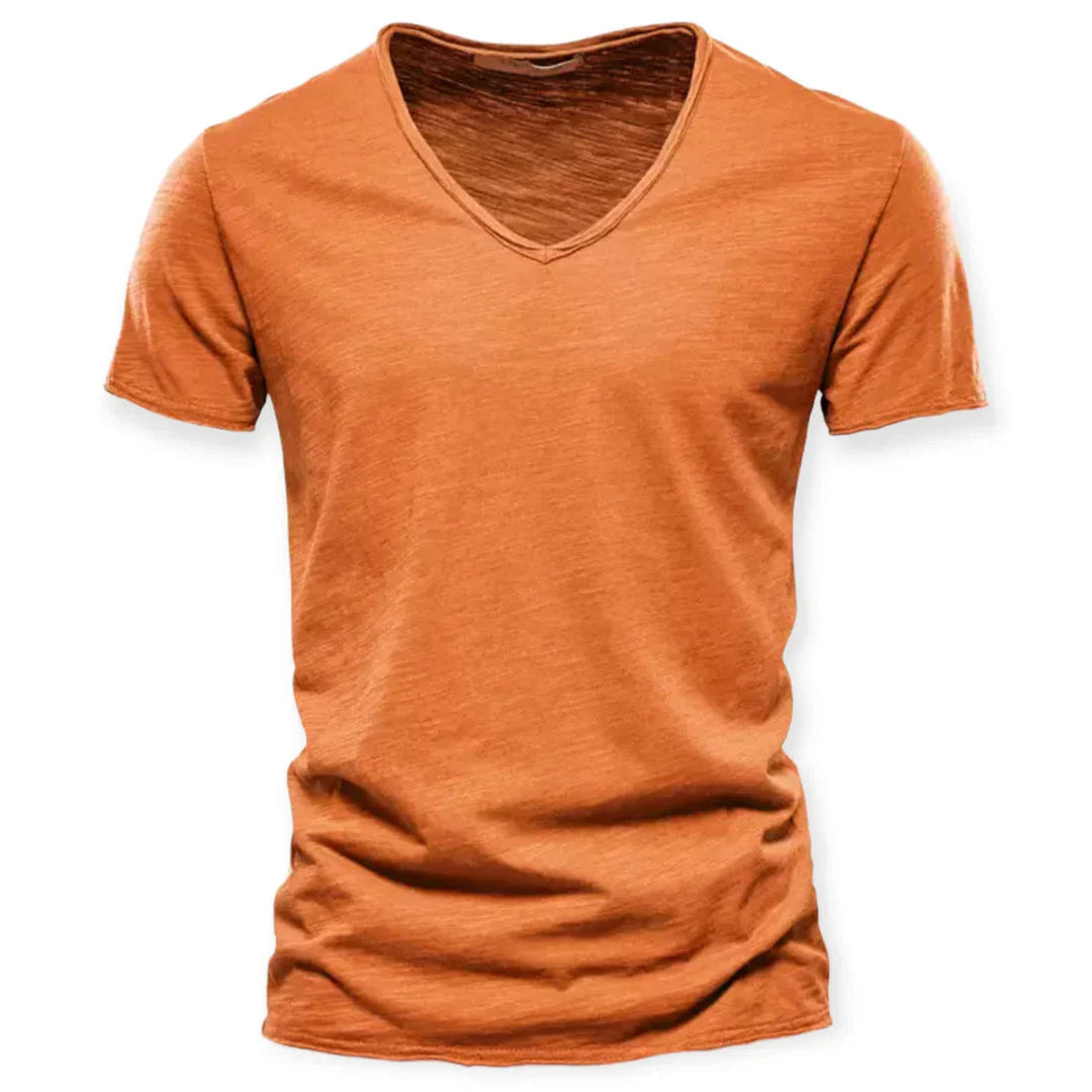 Close-up of men's V-neck t-shirt fabric, highlighting its breathable texture & quality for daily comfort.