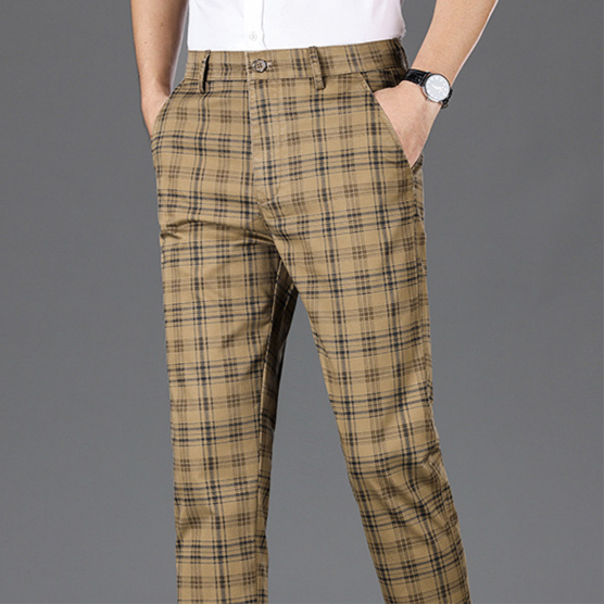 Casual yet sophisticated men's plaid trousers, a versatile modern fashion choice.