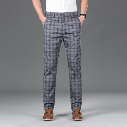 Tailored men's check trousers, offering a sophisticated look in men's fashion.