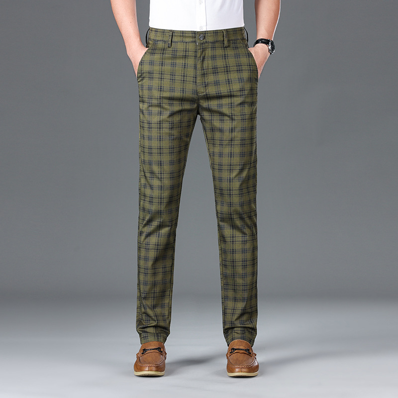 Modern men's tailored trousers with a chic check pattern, perfect for any occasion.