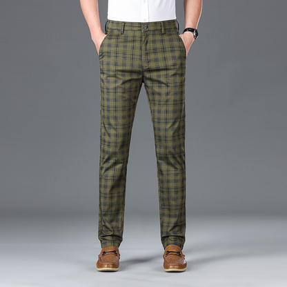 Modern men's tailored trousers with a chic check pattern, perfect for any occasion.