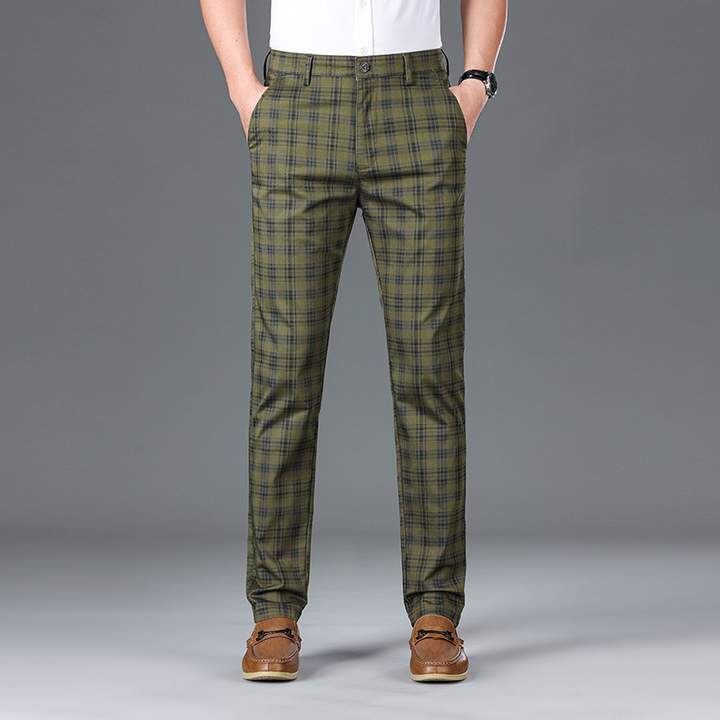 Modern men's tailored trousers with a chic check pattern, perfect for any occasion.