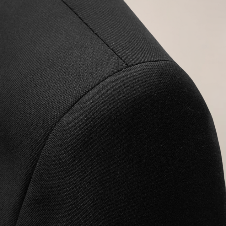 High-quality men's slim fit formal blazer. This tailored jacket offers sophisticated style for business & events.