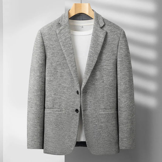 Men's sophisticated tailored blazer, perfect for smart business casual or formal wear, exuding modern style.
