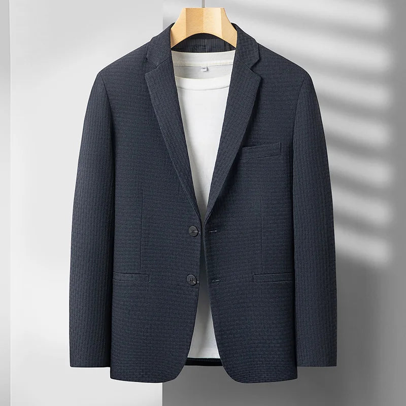 Blue men's tailored blazer, a versatile stylish coat for sophisticated warmth in business casual fashion.