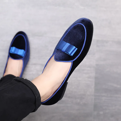 Classic men's almond-toe bow loafers, sleek slip-on formal footwear for elegant party or special occasion wear.