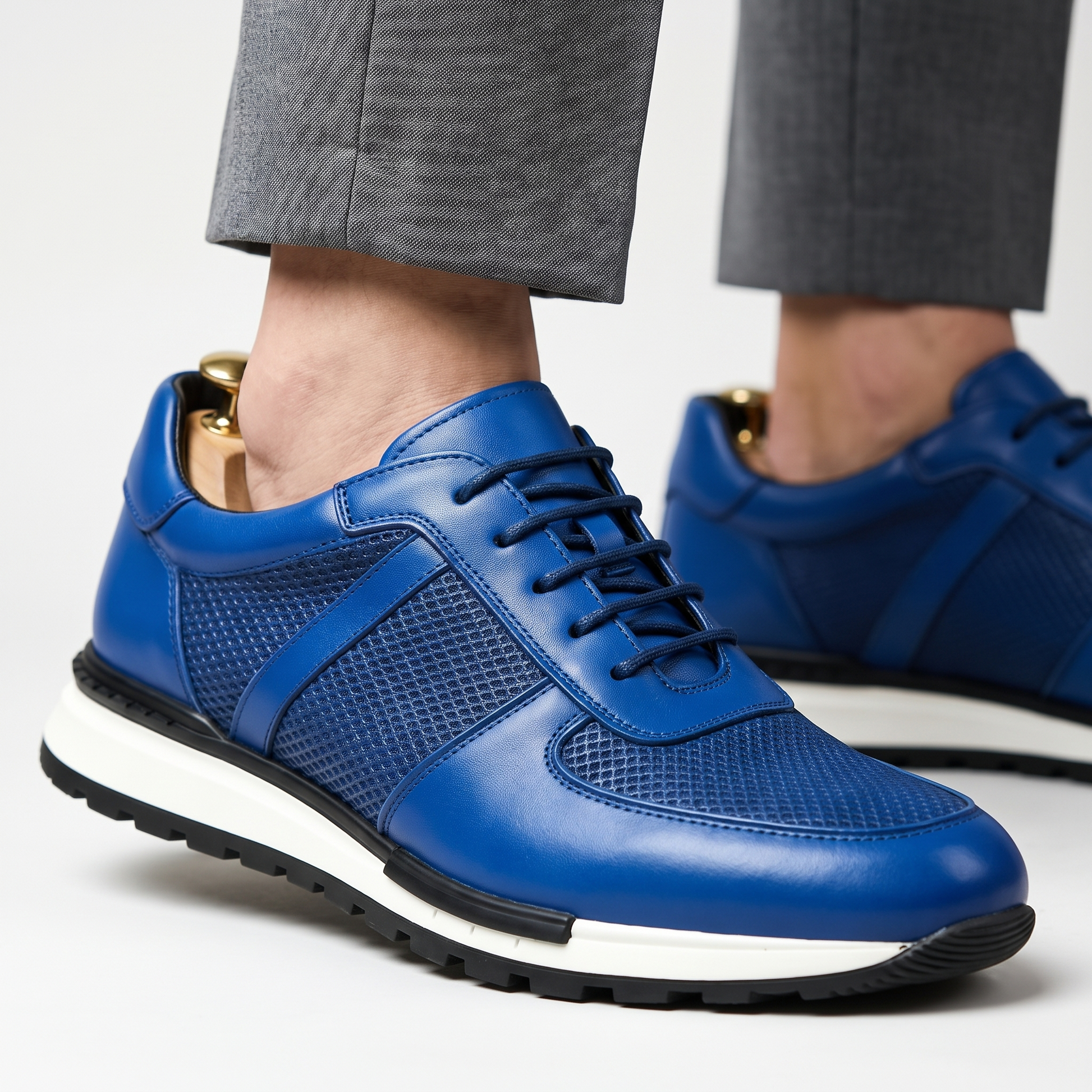 Side view of men's Spencer stylish leather mesh platform sneaker, comfortable casual footwear.