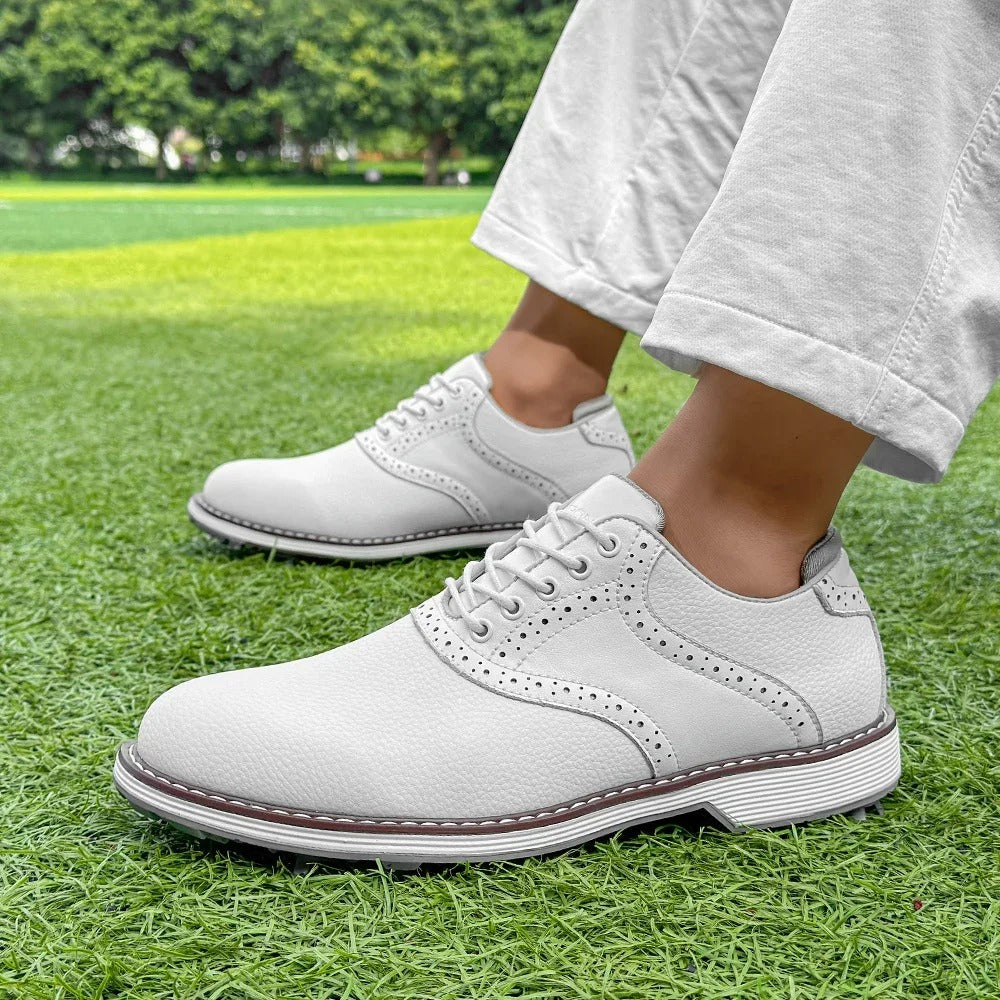 Achieve superior grip with men's spiked golf shoes. Classic brogue style, water-resistant golf footwear.