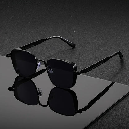 Black square frame men's sunglasses with UV400 protection. Anti-glare shades for a sleek, modern urban look.