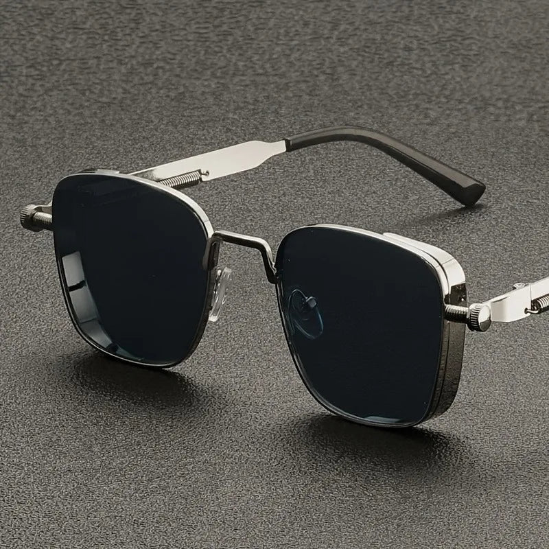 Stylish men's silver square frame sunglasses. UV400 protection & anti-glare for a sharp, modern accessory.