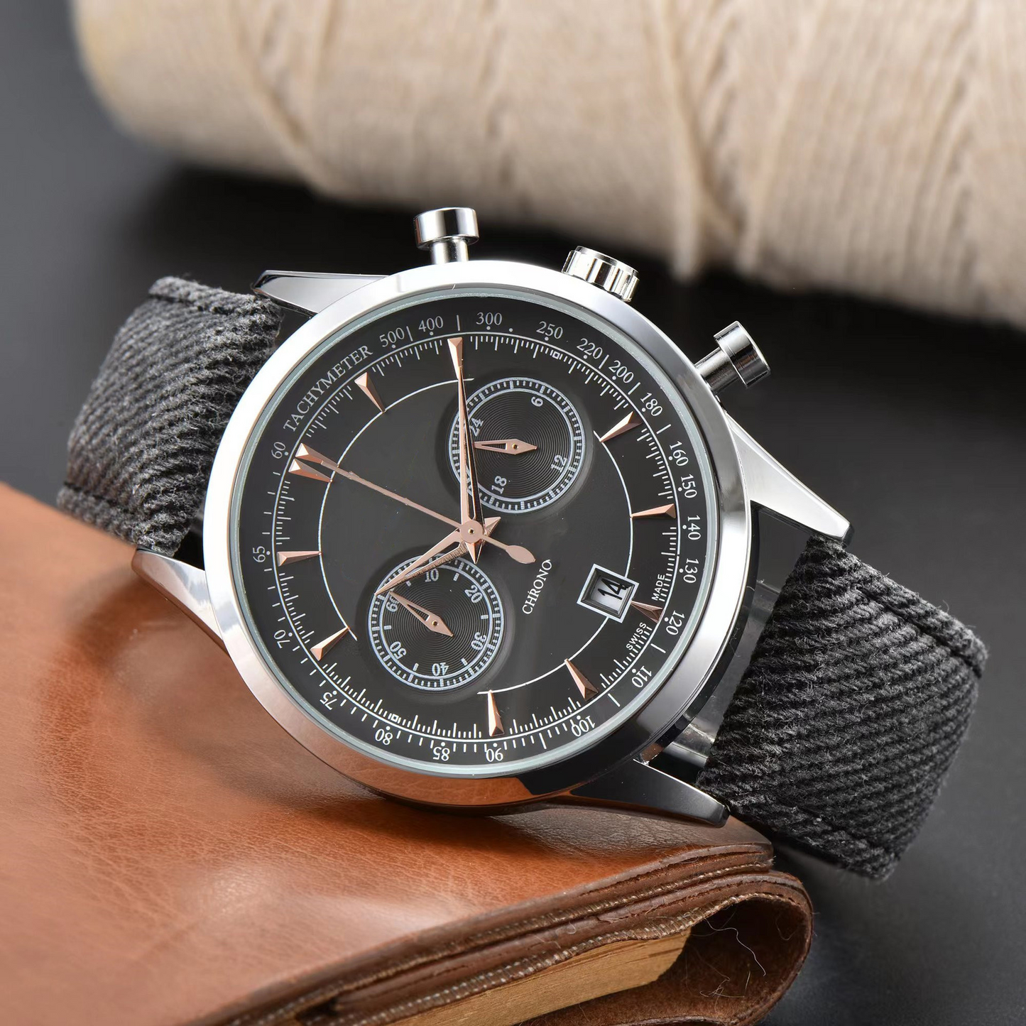 Men's stainless steel chronograph watch with a sleek black dial and precise timing functions. Perfect modern timepiece.
