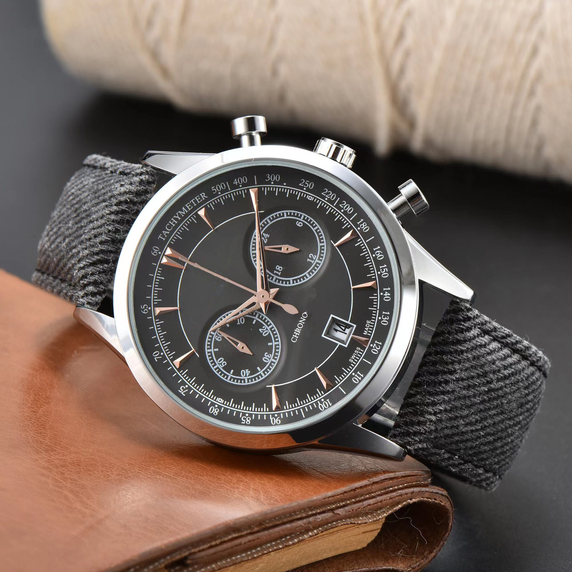 Men's stainless steel chronograph watch with a sleek black dial and precise timing functions. Perfect modern timepiece.