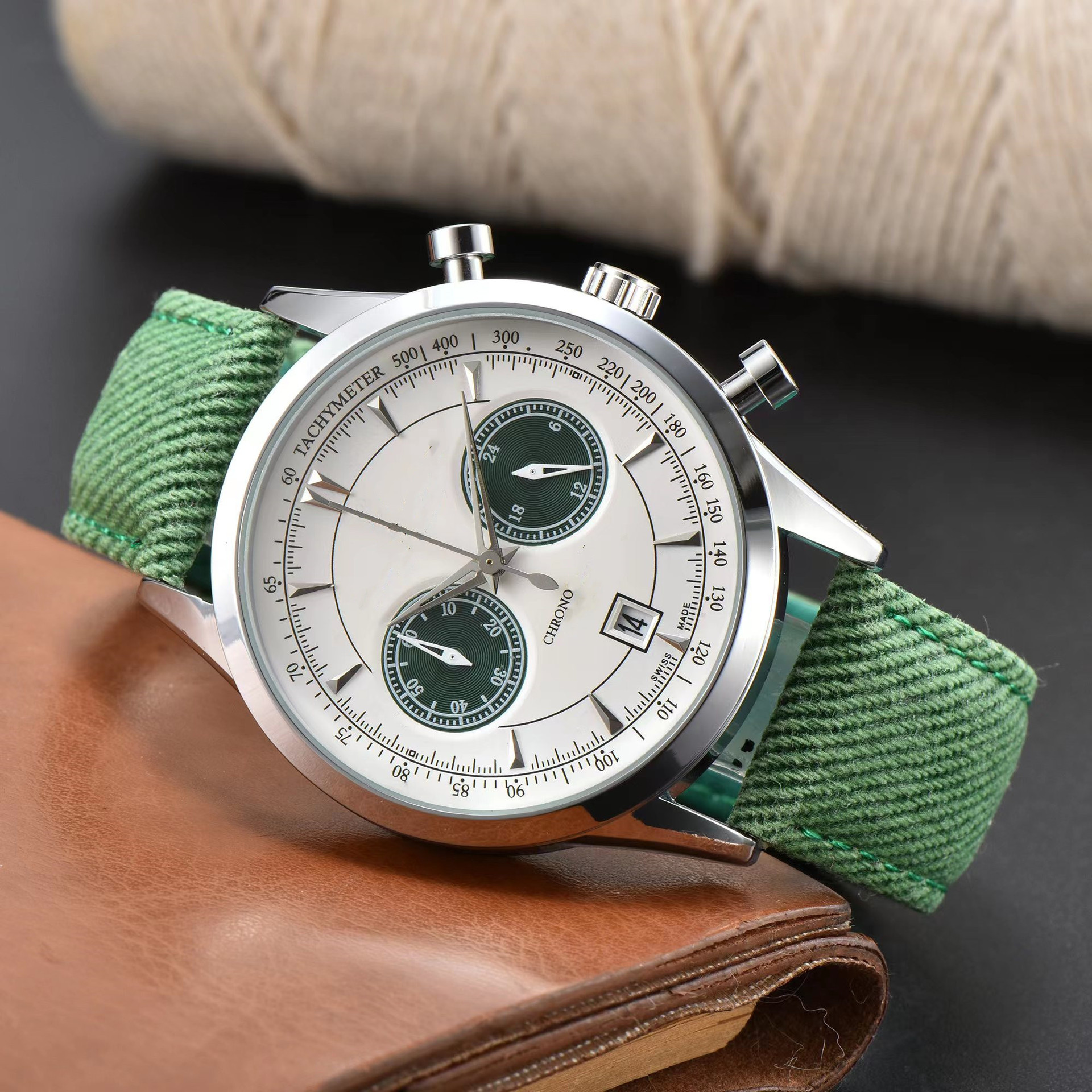 Precision men's chronograph timepiece with a stainless steel case, date window, and stylish canvas strap. Ideal for daily wear.