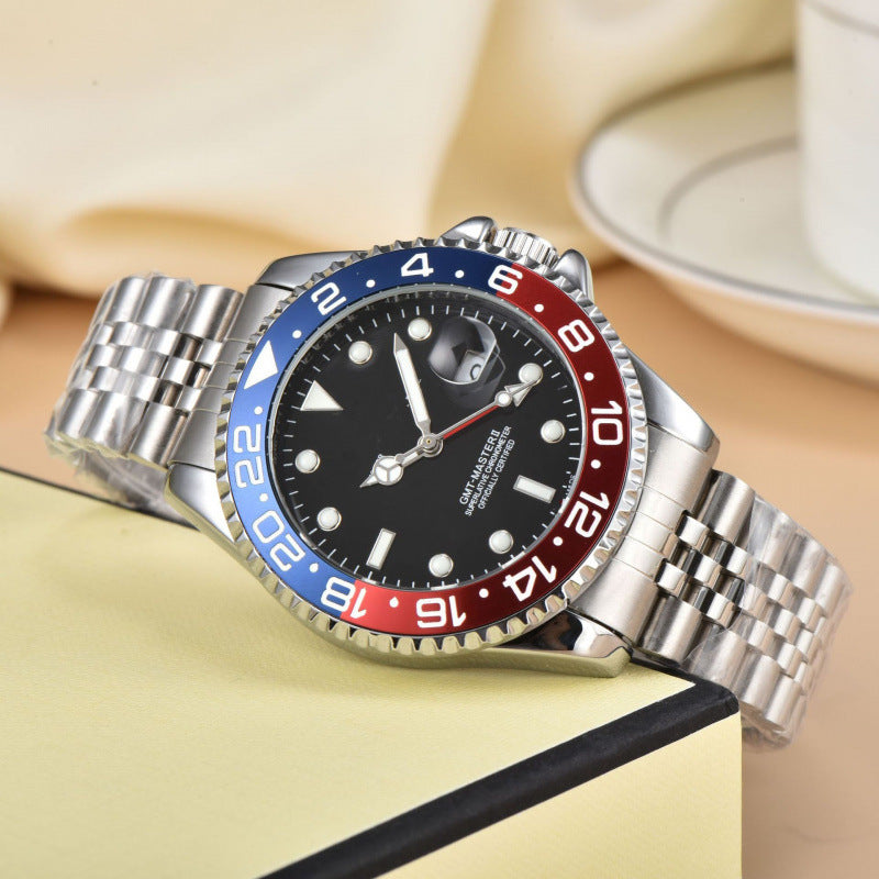 Close-up of a men's sport GMT watch, showcasing dual time zones & stainless steel case. Ideal for global travelers.