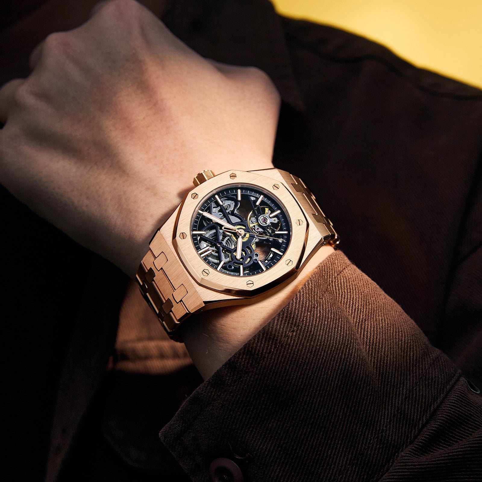 Rose gold tone men's stainless steel executive watch, stylish and durable business analog timepiece.