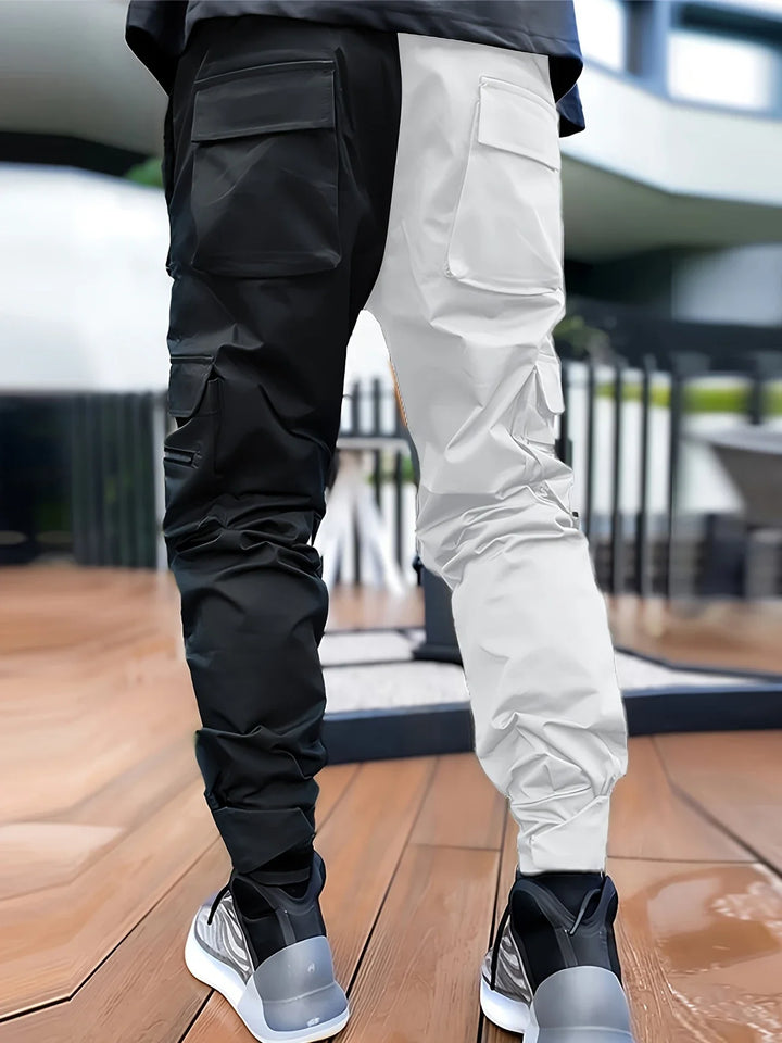Secure ankle cuffs on stealth men's joggers, providing a sleek, tapered fit for active use.