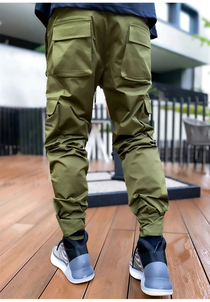 Full-length view of men's water-resistant reflective cargo joggers, built for durability and style.