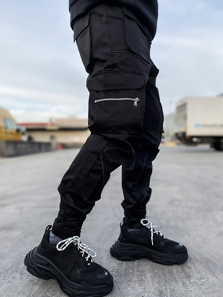 Close-up of reflective strip on men's stealth cargo joggers, enhancing low-light visibility.