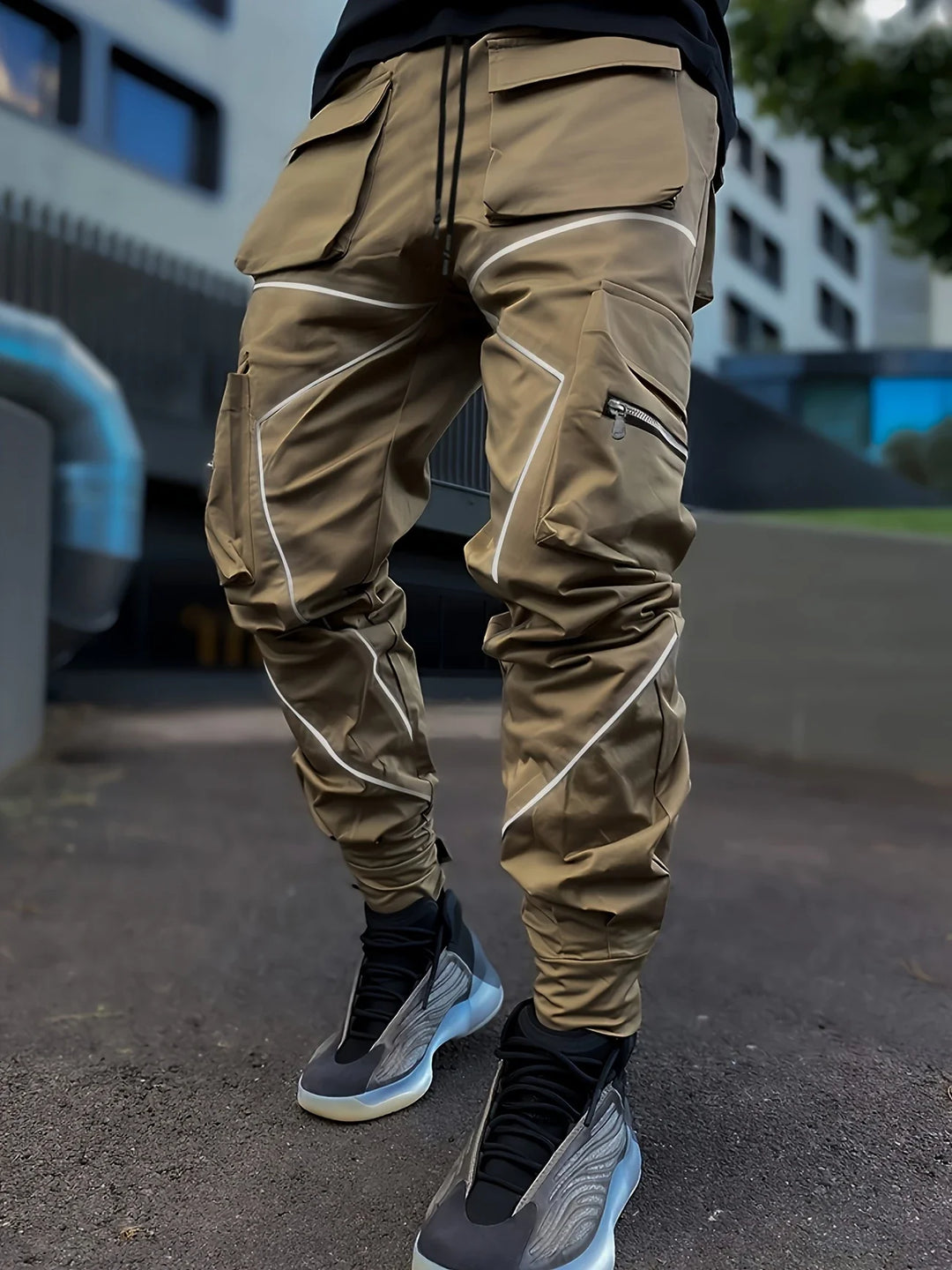 Detailed texture of breathable, water-resistant fabric on men's stealth cargo joggers.