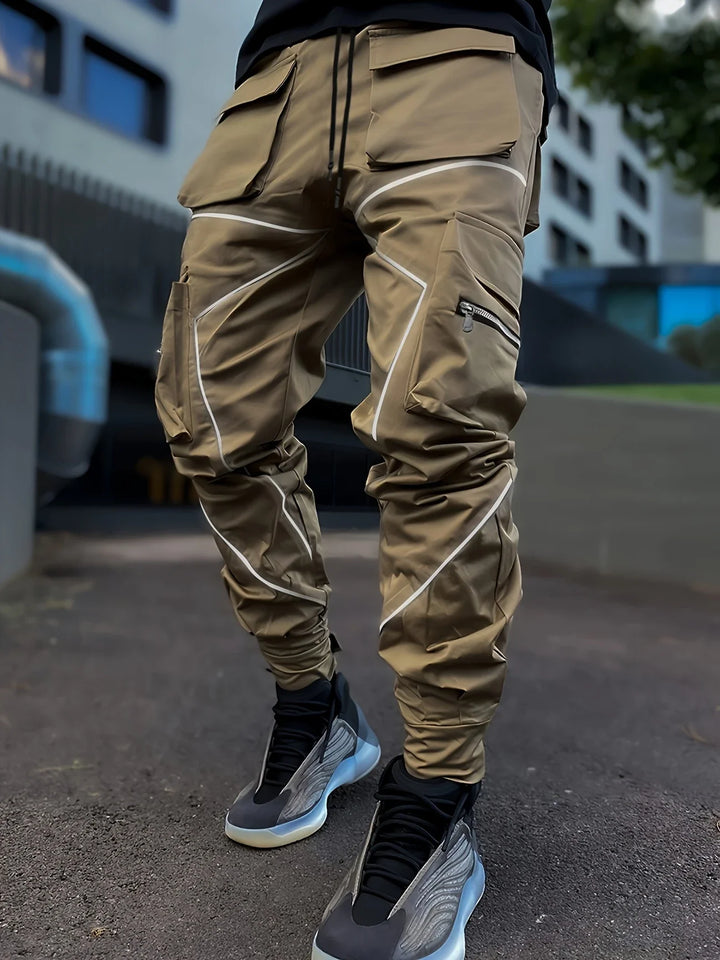 Detailed texture of breathable, water-resistant fabric on men's stealth cargo joggers.