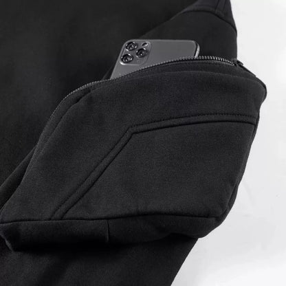 Men's full zip hoodie in stealth style, featuring a unique front shield and comfortable ribbed cuffs.