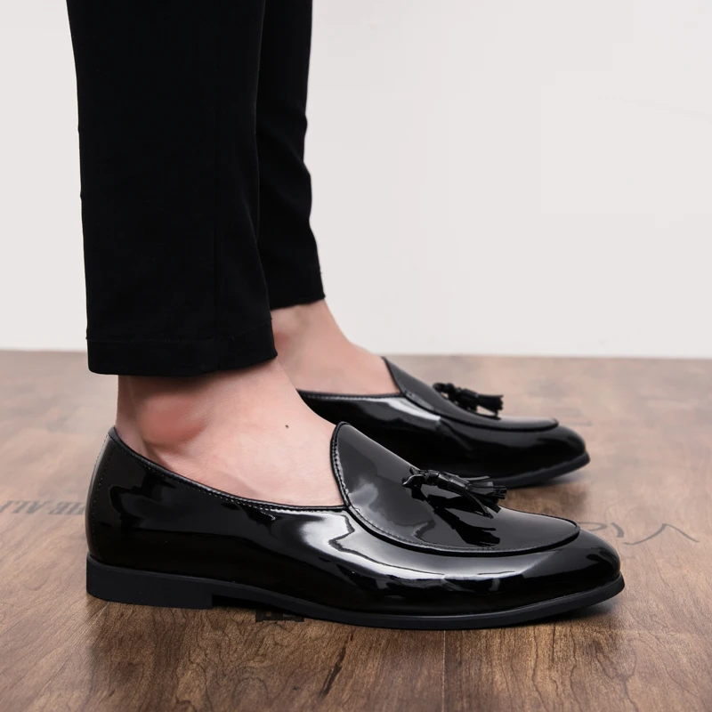 Men's comfortable loafers in Sterling Midnight, sleek formal shoes with stylish tassel details.