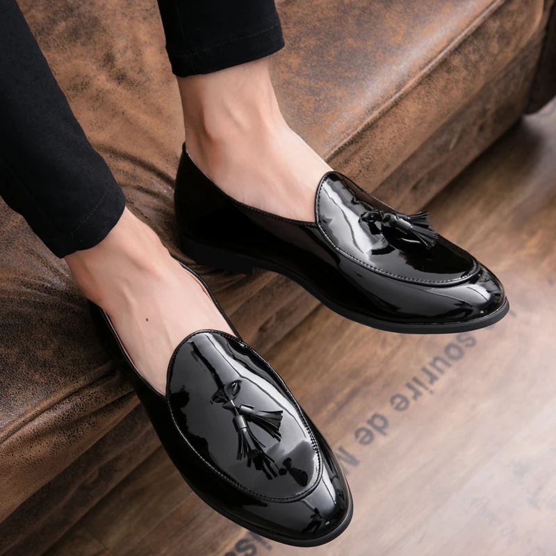 A pair of men's Sterling Midnight tassel loafers, versatile dress shoes for a polished and comfortable mens style.