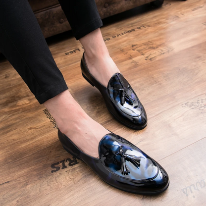 Close-up of men's tassel loafers in Sterling Midnight, showcasing premium craftsmanship and style.