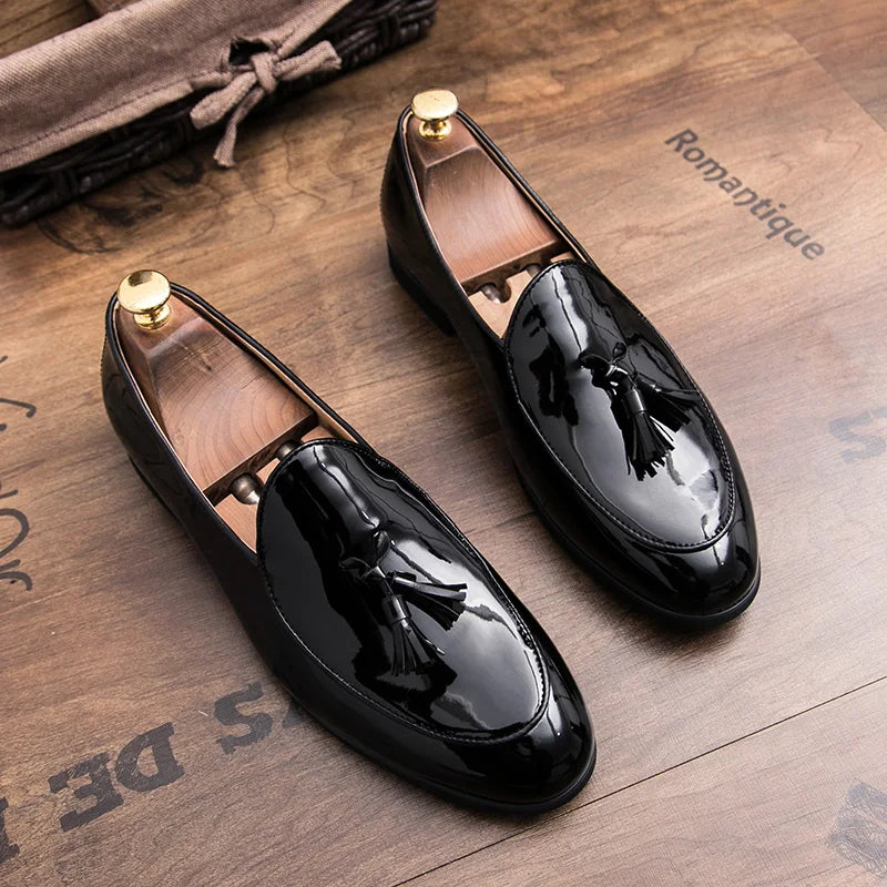Men's formal footwear: Elegant blue black tassel loafers, a key piece for any discerning wardrobe.
