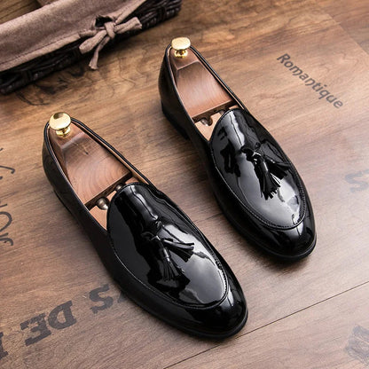Men's formal footwear: Elegant blue black tassel loafers, a key piece for any discerning wardrobe.