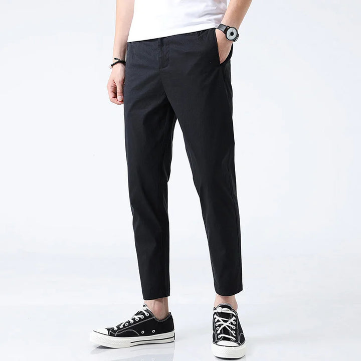 Stylish men's straight fit ankle length chinos, ideal versatile pants for modern casual or semi-formal looks.