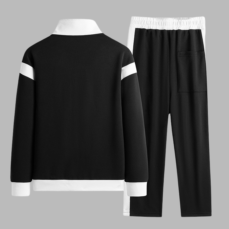 Gray men's athletic tracksuit, a two-piece jogger set designed for comfortable performance and sportswear.
