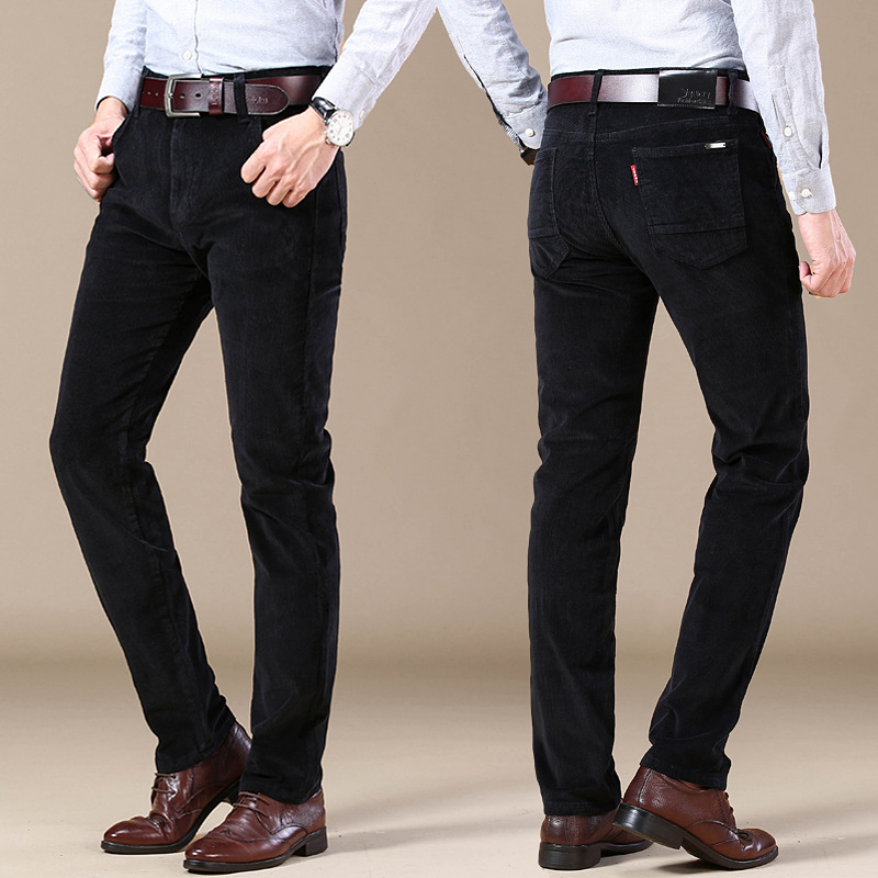 Man walking in comfortable stretch corduroy trousers, showcasing ease & tailored fit for men's casual wear.