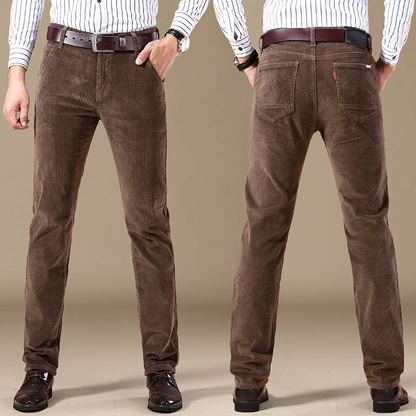 Man wearing comfortable tailored fit men's stretch corduroy trousers, perfect fall fashion for casual wear.
