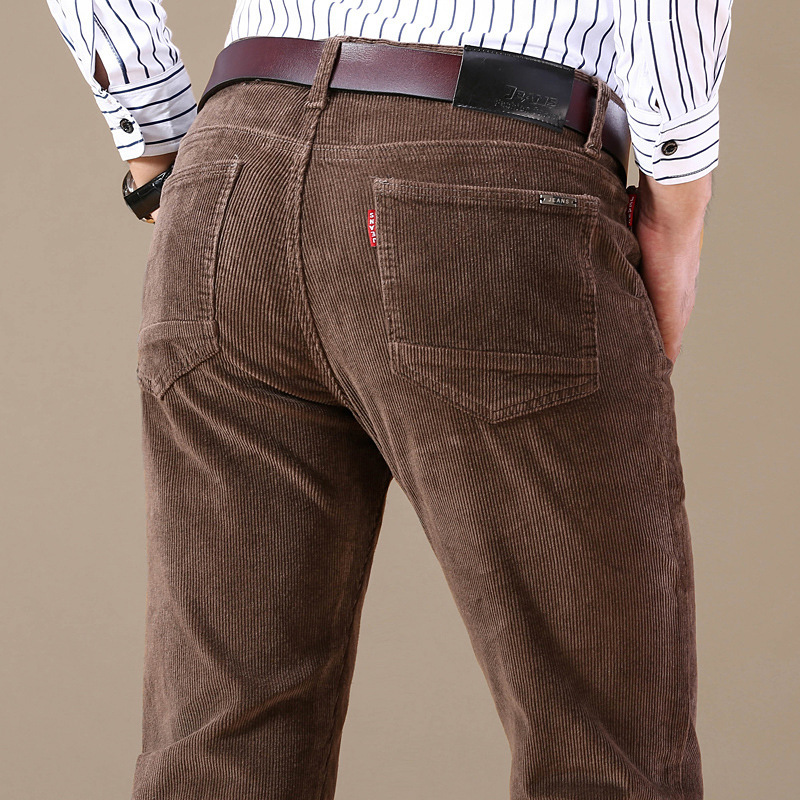 Man showcasing stretch & comfort of corduroy trousers, ideal men's casual pants for all-day wear.