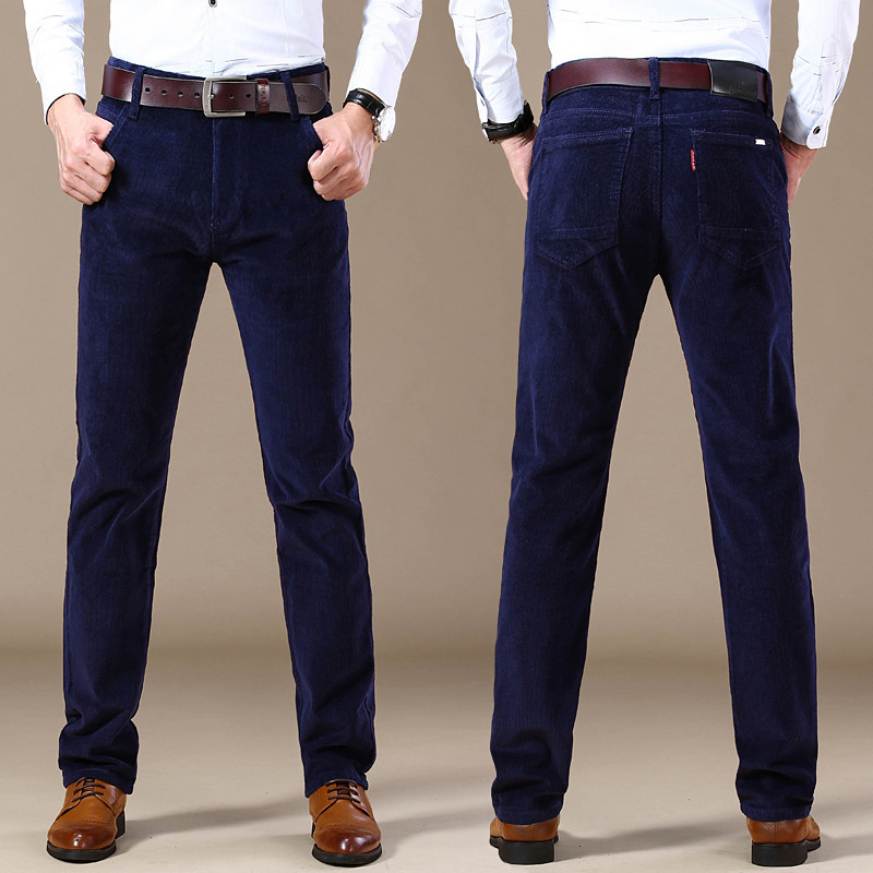 Detail of leg opening on men's tailored fit stretch corduroy trousers, versatile men's casual pants.