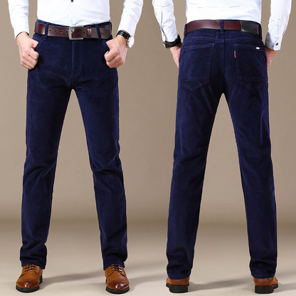 Detail of leg opening on men's tailored fit stretch corduroy trousers, versatile men's casual pants.
