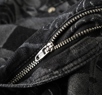 Detail view: Etched design on premium men's stretch denim jeans. Comfort fit for modern men's fashion.