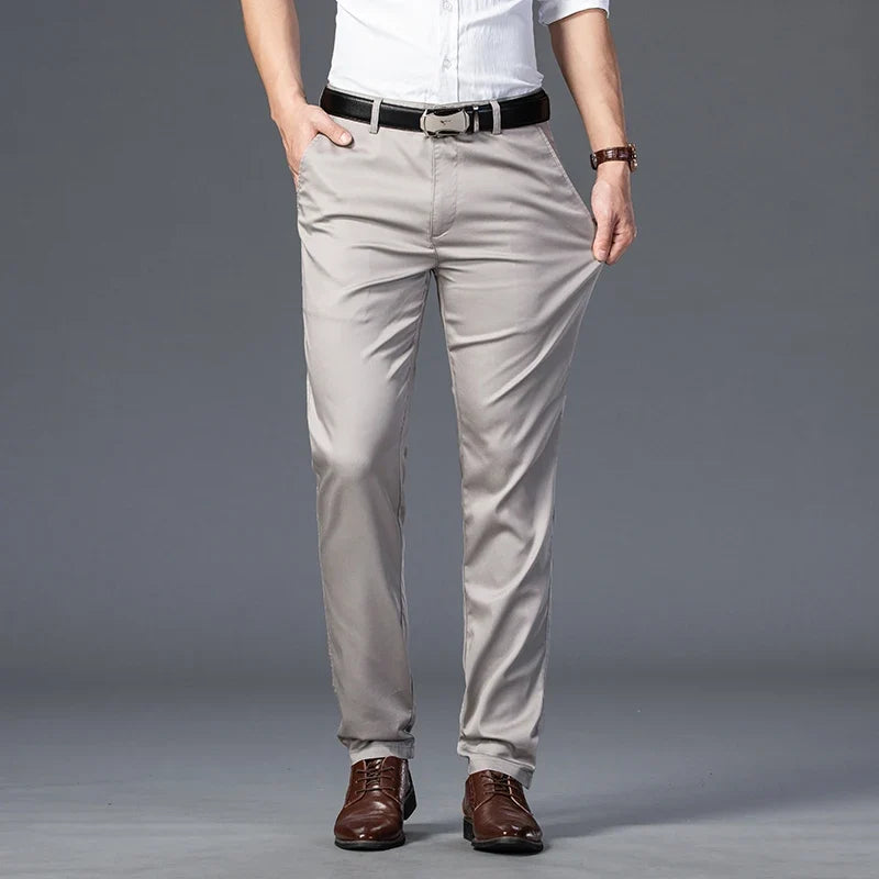 Men's comfortable stretch trousers with a modern fit. Cotton blend fabric, perfect for casual, formal, or active use.