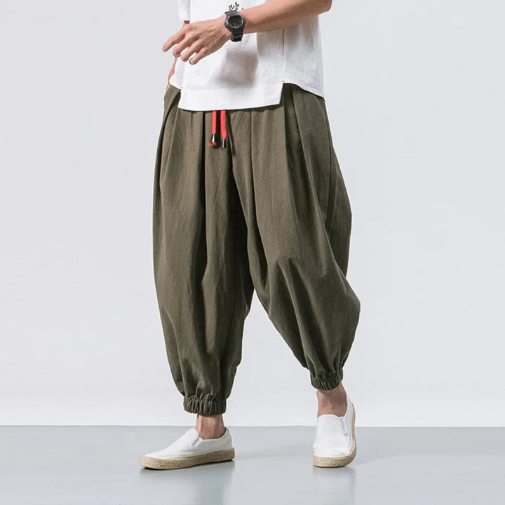 Side view of men's Stride baggy harem joggers, showcasing relaxed fit, casual style, and ultimate comfort.